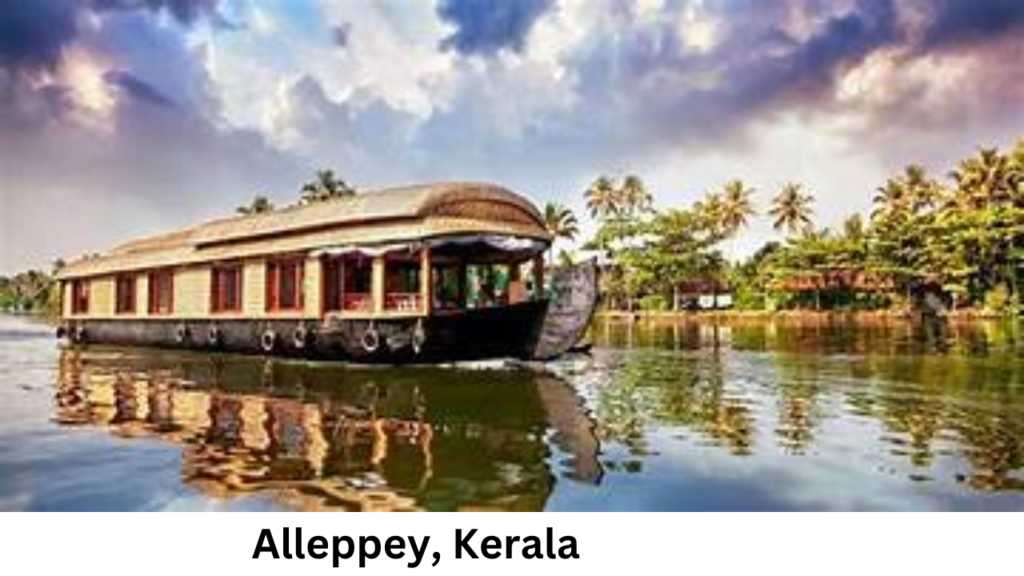 "Traditional houseboat in Alleppey backwaters, perfect for an affordable honeymoon places in INDIA and romantic honeymoon in India."
